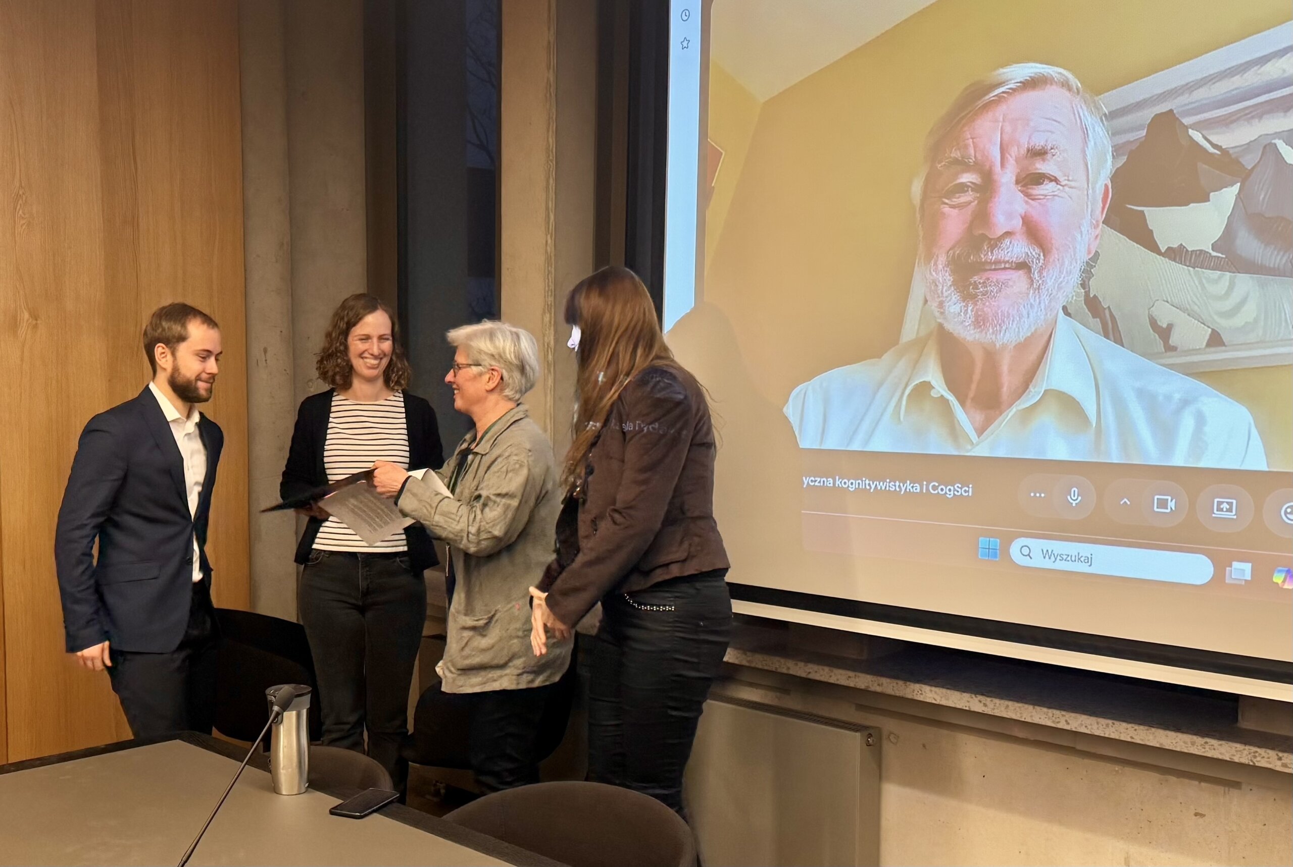 Maciej Ołdakowski receiving the Robert J. Glushko Award for the best MA thesis
